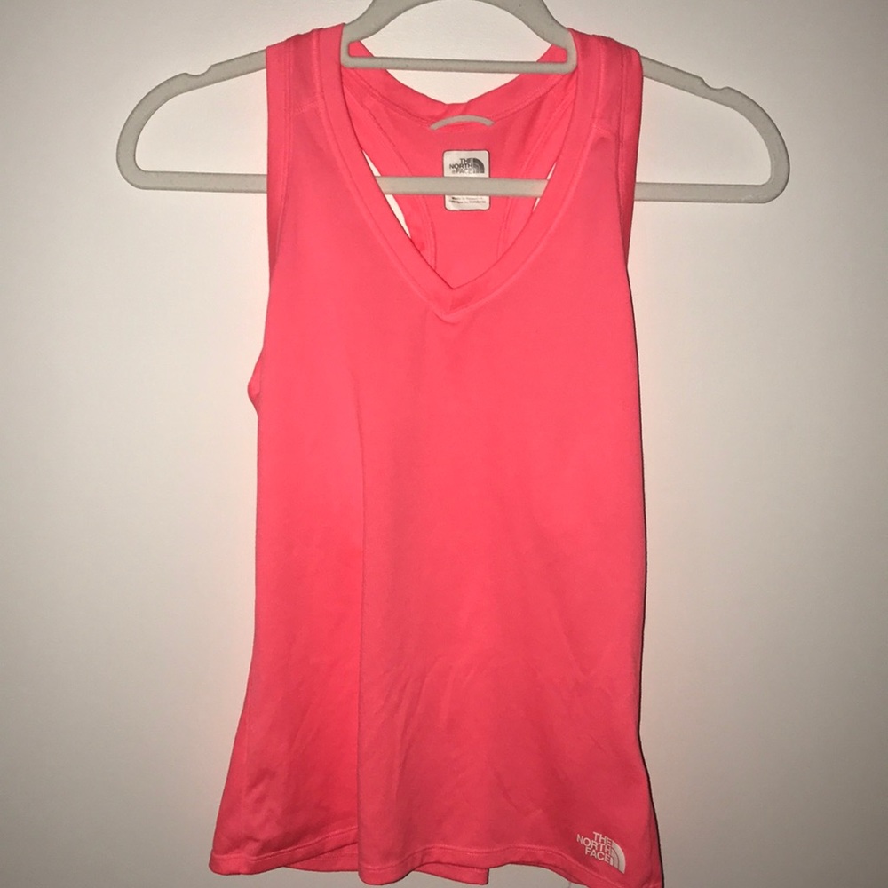 Peach / coral colored North Face running top
